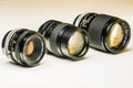 Three old photographic lenses Royalty Free Stock Photo