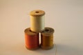 Three Wooden Spools of Thread Royalty Free Stock Photo