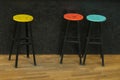 Three old style bar stools Royalty Free Stock Photo