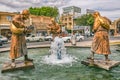 Three old travelers statues in Yazd