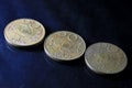 Three old twenty Paise nickel brass round coin of India 1971 with lotus flower engraved on black background. 20 Paise old coins