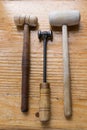 Three old wood and metal hammers used to strike the sematron Royalty Free Stock Photo