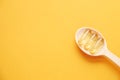 Yellow nutritional supplement pills full of Omega 3 fatty acids. Royalty Free Stock Photo