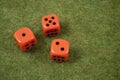 Three orange dice Royalty Free Stock Photo