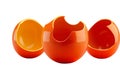 Three Orange EggShaped Containers on a White Background Royalty Free Stock Photo