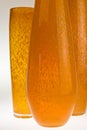Three orange glass vases Royalty Free Stock Photo