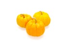 Three orange pumpkins in Big, medium, and small size isolated on white background Royalty Free Stock Photo