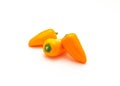 Three organic orange mini sweet peppers snack isolate on white Royalty Free Stock Photo