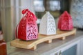 Three Oriental lamps candlesticks red and white