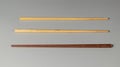 Three oriental wooden chopsticks to eat Royalty Free Stock Photo