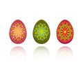 Three ornate eggs