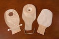 Three ostomy bags