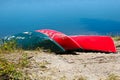 Three overturned canoes along a lake shore Royalty Free Stock Photo