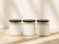 Three 9 oz scented soy candle jars mockup