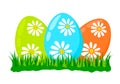 Three painted egg lying in spring grass green . blue and orange decorated with daisy flowers, Easter decoration symbol