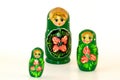 Three painted nesting dolls