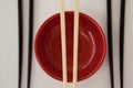 Three pair of chopsticks and bowl