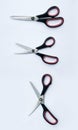 Three pair of scissors ready to cut Royalty Free Stock Photo