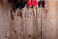 three pair of shoes representing family, growth, education and togetherness concept