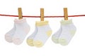Three pairs baby socks hanging