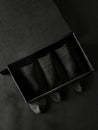 Three pairs of black socks in a box Royalty Free Stock Photo