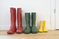 Three pairs of colorful wellingtons Royalty Free Stock Photo