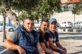 Three Palestine young men sitting at the park on the Mount of Olives, Jerusalem