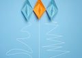 Three paper boats with different trajectories on a blue background, concept of goal achievement differences, effectiveness Royalty Free Stock Photo