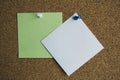 Three paper notes green, white and yellow color on a cork Board, attached with a white pushpin. Copy space Royalty Free Stock Photo