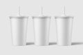 Three paper soda cup with straw mockup template, isolated on light grey background.