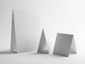 Three paper standees isolated on white background Royalty Free Stock Photo