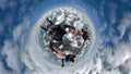 Three parachutists holding hands with a 360 degree camera. Royalty Free Stock Photo