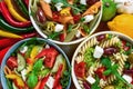 Three pasta salad with tomato,arugula,cucumber, peppers,hot peppers, black and green olives, and cheese Royalty Free Stock Photo