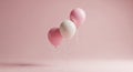 Three pastel balloons, two pink and one white, on a soft pink background party celebration Royalty Free Stock Photo