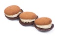 Three pastry biscuit sandwich with chocolate