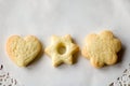 Three pastry biscuits close up isolated on a white paper