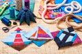 Three patchwork blocks lighthouse, yacht and anchor, fabrics, quilting tools and accessories