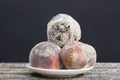 three peaches with mold Royalty Free Stock Photo