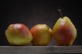 Three pears on old table Royalty Free Stock Photo