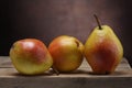 Three pears on old table Royalty Free Stock Photo