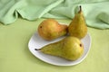 Three pears on the plate Royalty Free Stock Photo