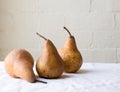 Three pears on table