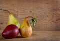 Three pears on a wooden plank Royalty Free Stock Photo