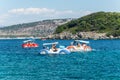 Three pedal boats on the Ionian Sea near the Twin Islands beach in Ksamil, Albania