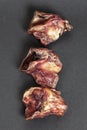 Three peices of dried beef larynxes used in exotic cuisine or as natural chewy treats for dogs. Royalty Free Stock Photo