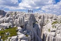 People on top of rocky mountains in Montenegro. Royalty Free Stock Photo