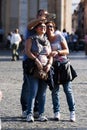 Three people doing selfie with smartphone