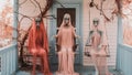 three people dressed up as ghosts standing on a porch