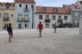 Three people sightseeing around Lisbon