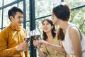 Three people toasting red wine at restaurant Royalty Free Stock Photo